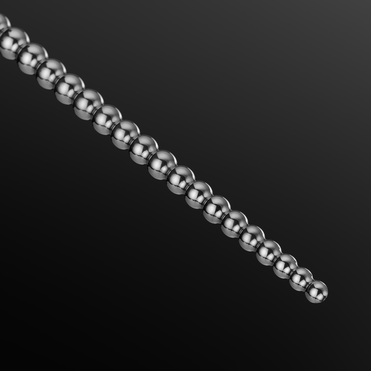 Bubbles 5-8 mm urethral sounding rod, variant Stainless steel on purple background