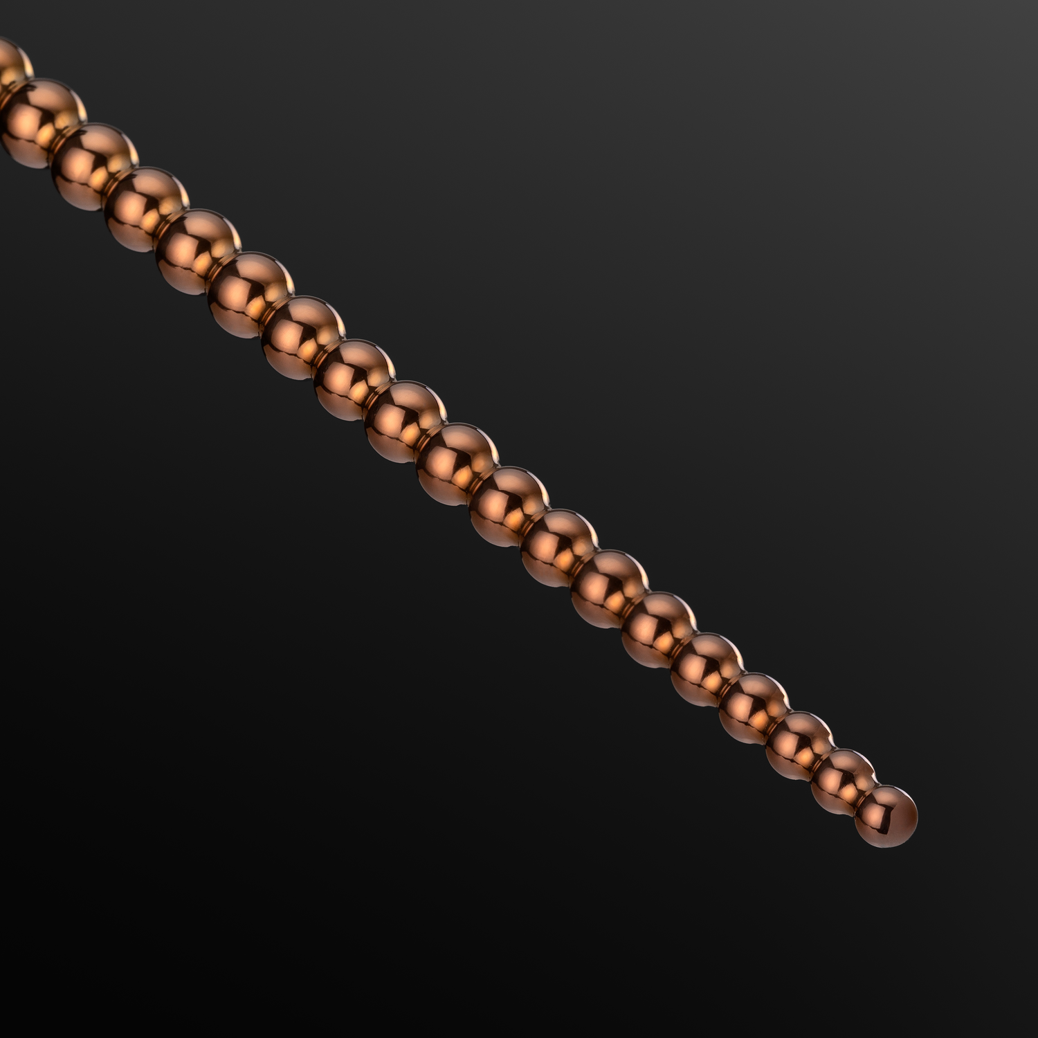 Bubbles 5-8 mm urethral sounding rod, variant PVD Rosegold on purple background